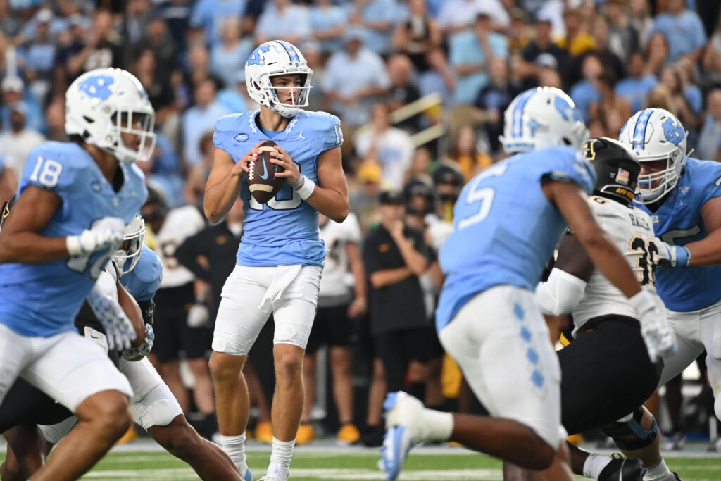 Drake Maye looks to throw in the pocket