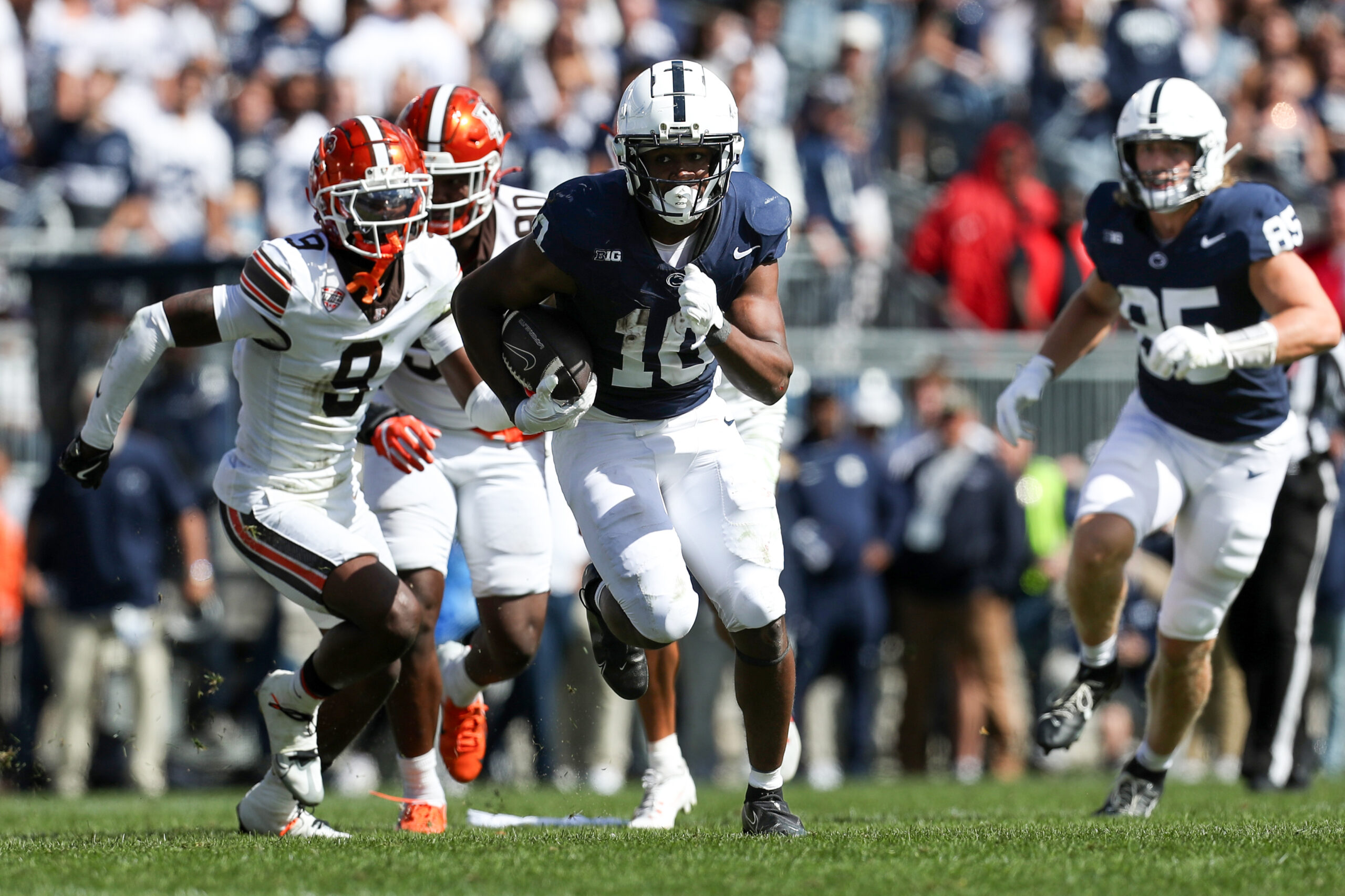 Penn State Nittany Lions running back Nicholas Singleton runs with the ball during the fourth quarter against the Bowling Green Falcons at Beaver Stadium.