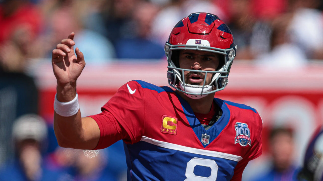 Daniel Jones motions while preparing for the play