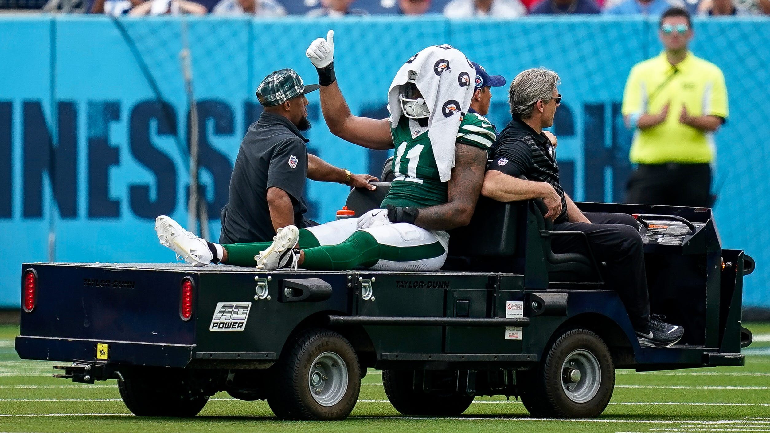 Jermaine Johnson is carted off the field after an Achilles injury