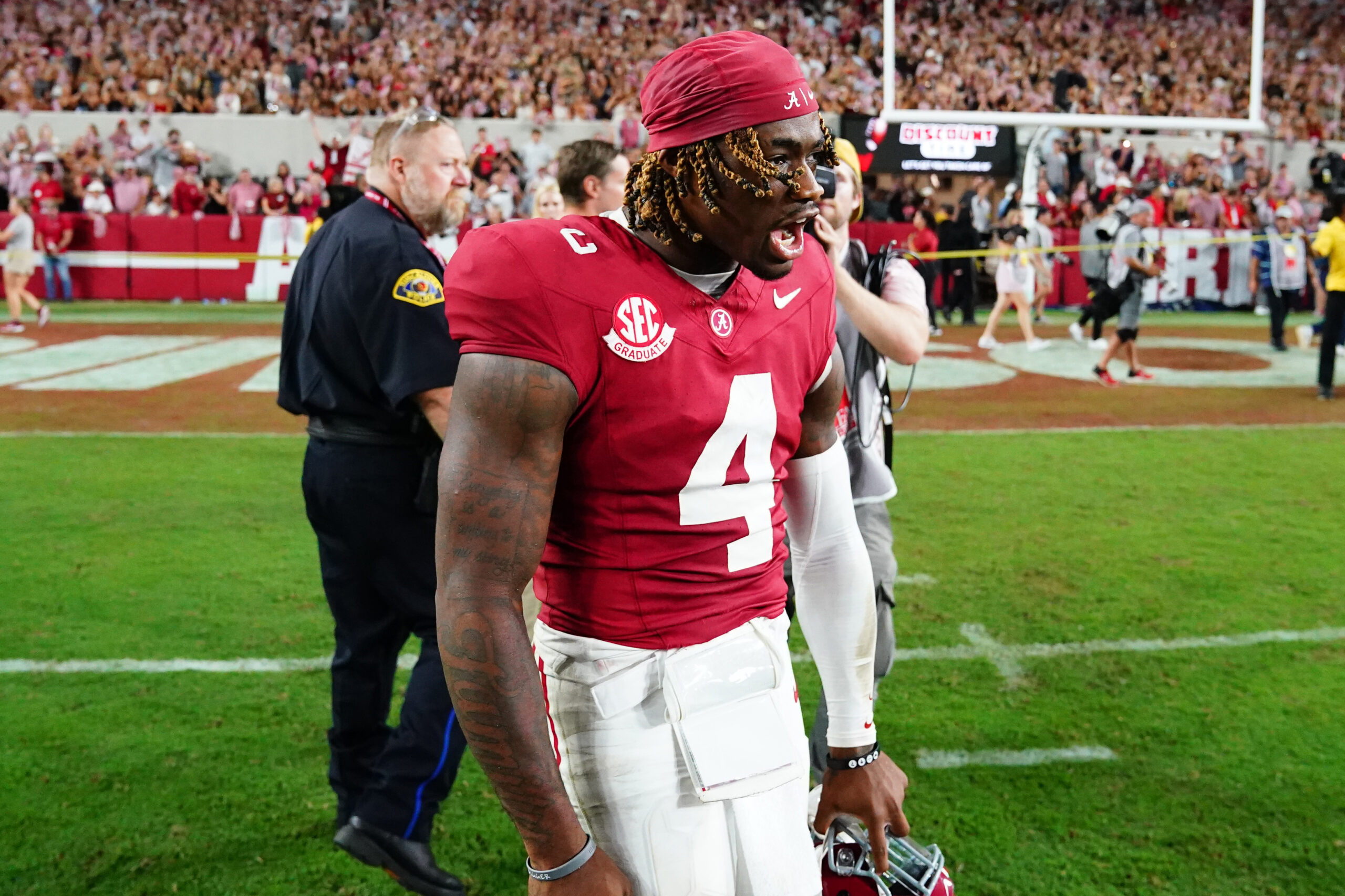 Alabama Crimson Tide quarterback Jalen Milroe (4) celebrates after defeating the Georgia Bulldogs at Bryant-Denny Stadium.