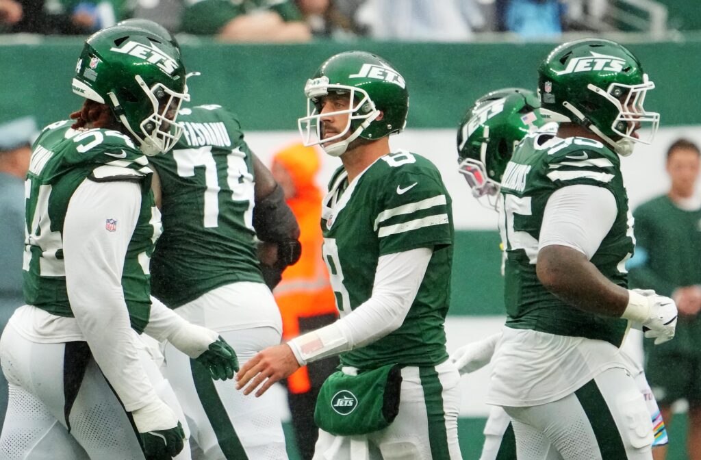 New York Jets quarterback Aaron Rodgers (8) reacts after the Jets failed to score on the  Denver Broncos late in the fourth quarter at MetLife Stadium. 