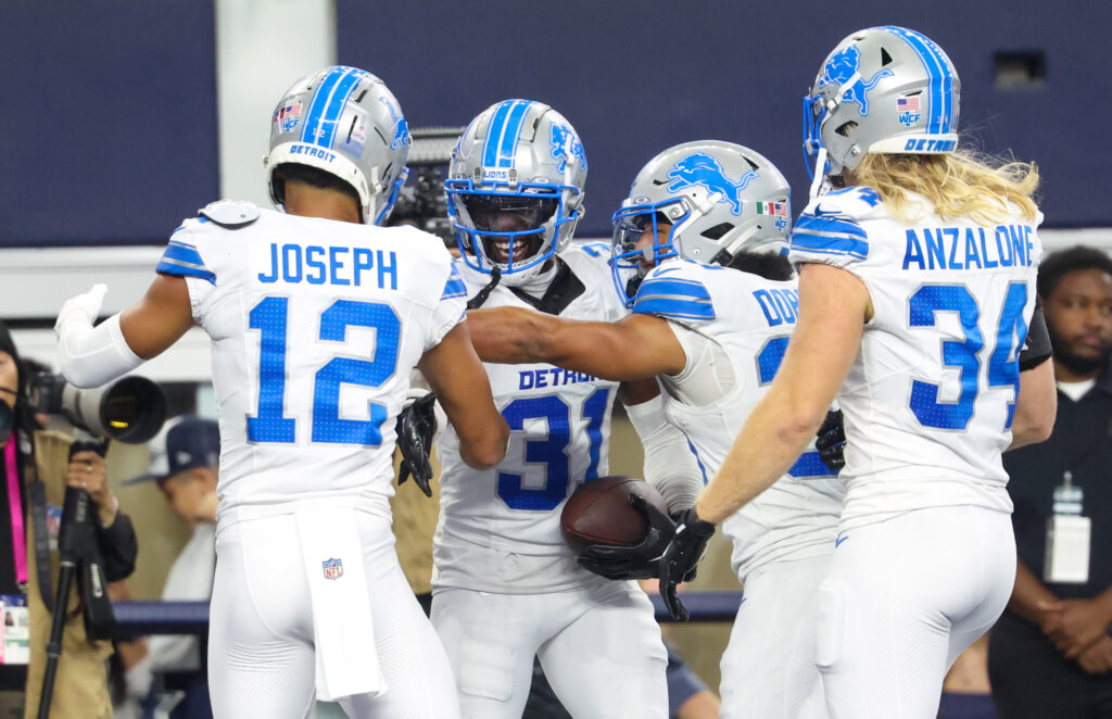 Detroit Lions defense celebrates after an interception