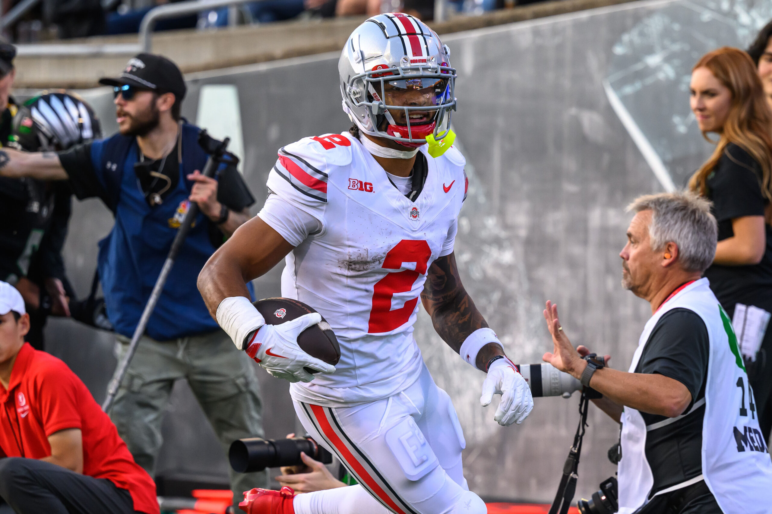 Ohio State Buckeyes wide receiver Emeka Egbuka (2) catches a pass for a touchdown during the first half against the Oregon Ducks at Autzen Stadium.