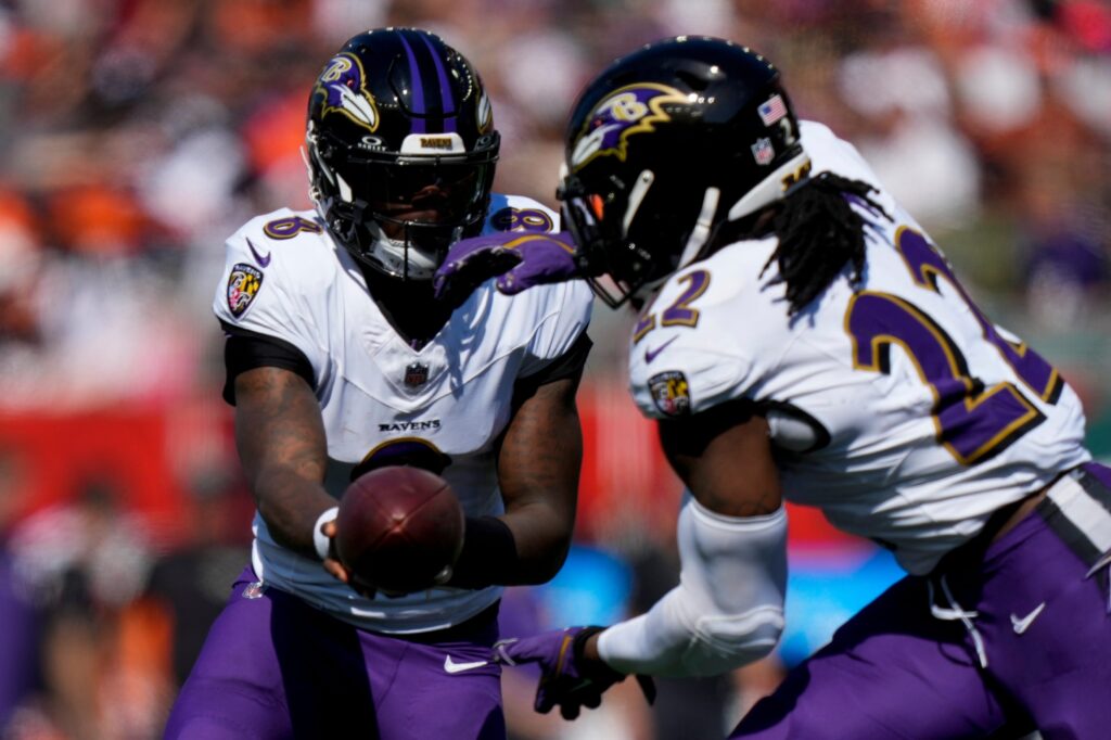 Baltimore Ravens running back Derrick Henry and quarterback Lamar Jackson