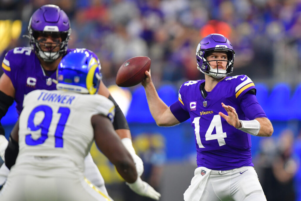 Minnesota Vikings quarterback Sam Darnold throws against the Los Angeles Rams during the first half at SoFi Stadium. 