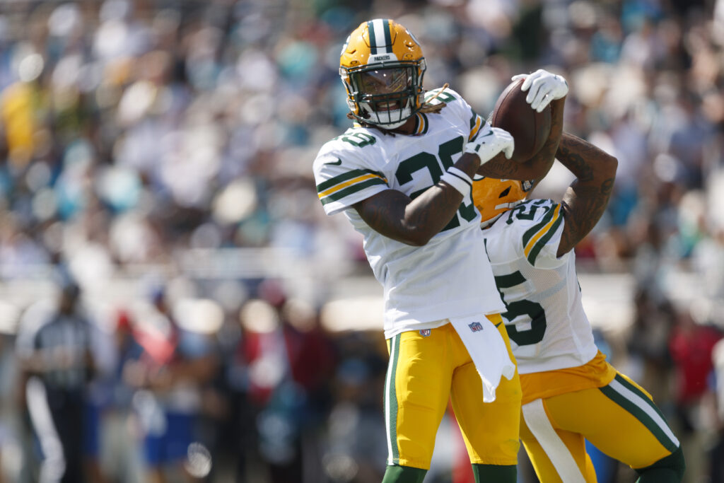 Green Bay Packers safety Xavier McKinney and cornerback Keisean Nixon celebrating an interception against the Jacksonville Jaguars during the second quarter at EverBank Stadium in Jacksonville, Florida on October 27, 2024