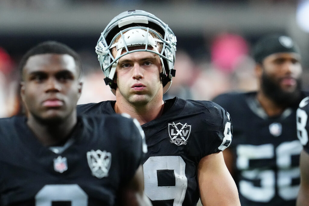 Las Vegas Raiders tight end Brock Bowers walks off the field after the Raiders were defeated by the Kansas City Chiefs 27-20 at Allegiant Stadium. 