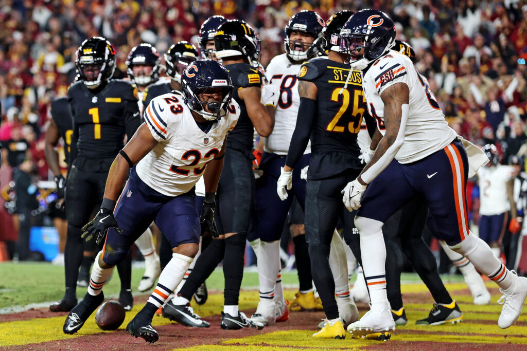 Chicago Bears running back Roschon Johnson (23) celebrates after scoring a touchdown during the fourth quarter against the Washington Commanders at Commanders Field.