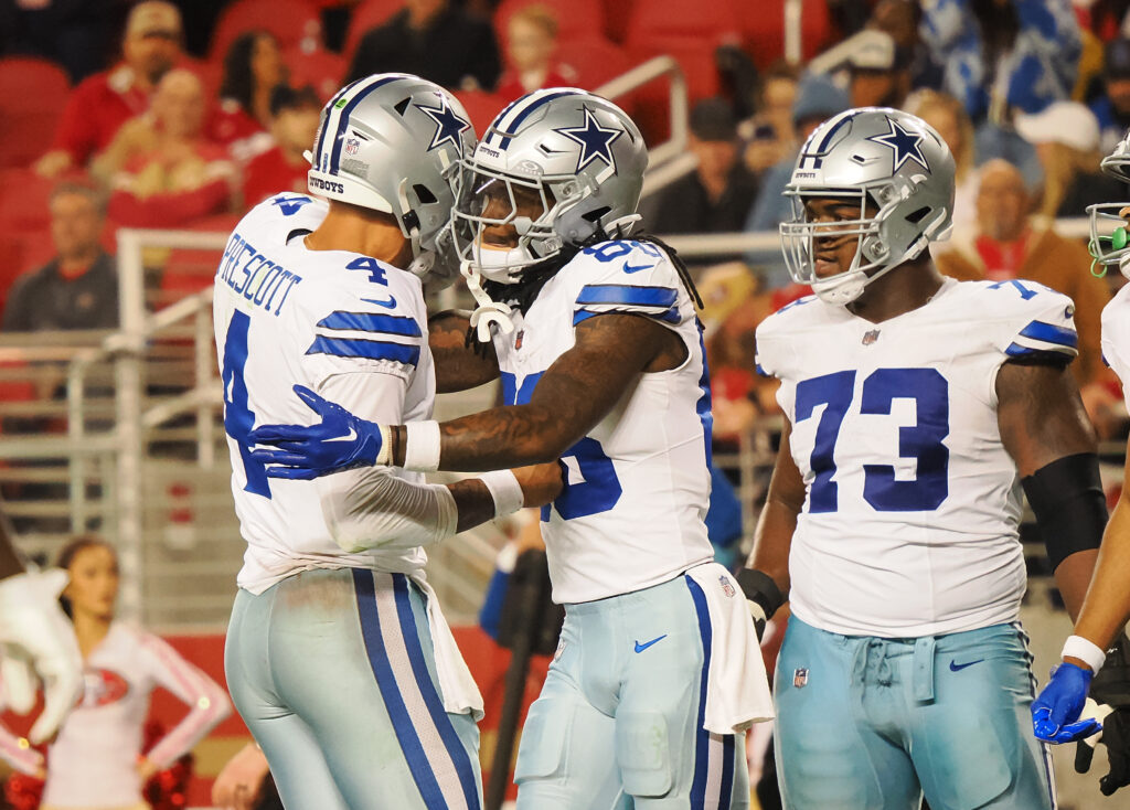 Dallas Cowboys quarterback Dak Prescott (4) celebrates with wide receiver CeeDee Lamb after a touchdown against the San Francisco 49ers during the fourth quarter at Levi's Stadium.