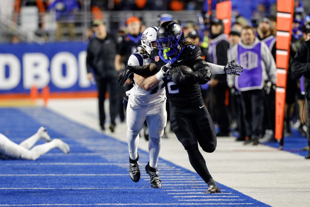 Boise State Broncos running back Ashton Jeanty runs for a first down against Nevada Wolf Pack in college football game action at Albertsons Stadium