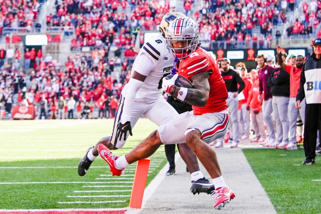 Ohio State Buckeyes wide receiver Emeka Egbuka scores a touchdown against the Purdue Boilermakers in college football game action at Ohio Stadium