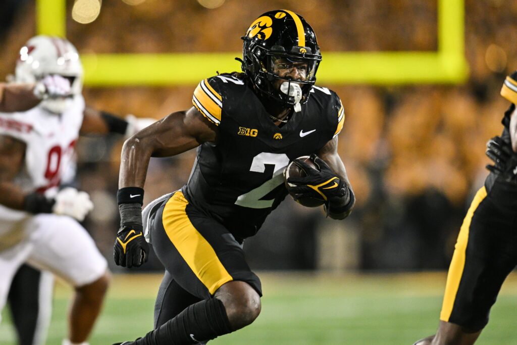 Iowa Hawkeyes running back Kaleb Johnson (2) runs the ball against the Wisconsin Badgers during the second quarter at Kinnick Stadium.