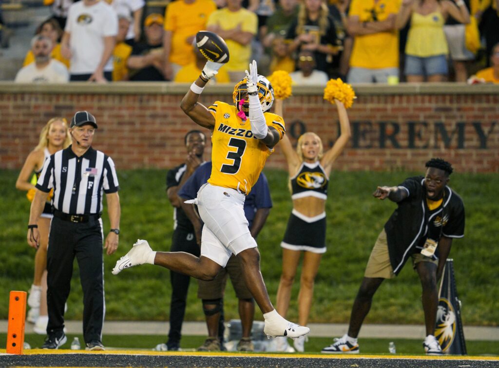 Missouri Tigers wide receiver Luther Burden III catches a touchdown pass during overtime against the Vanderbilt Commodores in college football game action at Faurot Field at Memorial Stadium