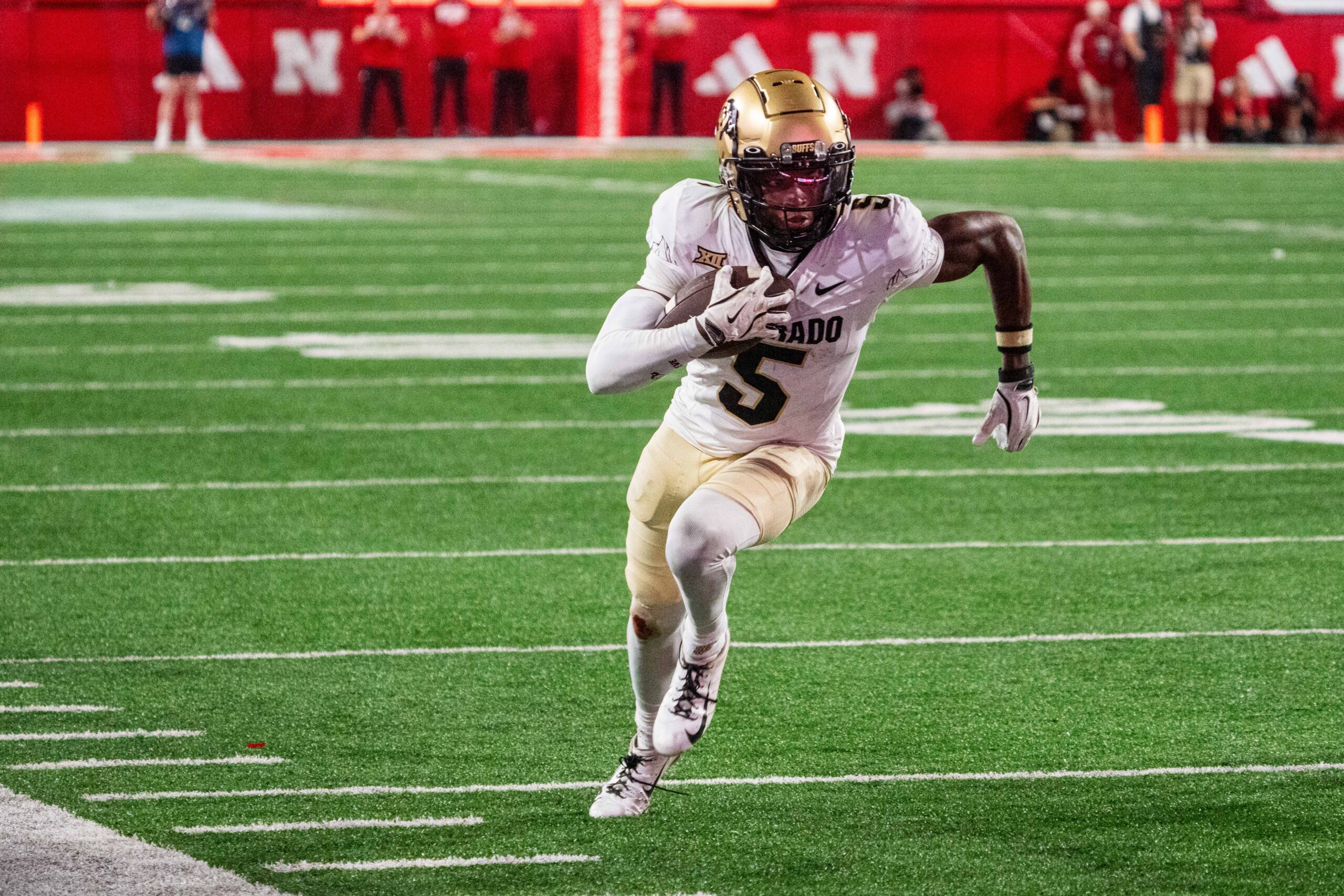 Colorado Buffaloes wide receiver Jimmy Horn Jr. (5) runs against the Nebraska Cornhuskers during the fourth quarter at Memorial Stadium.