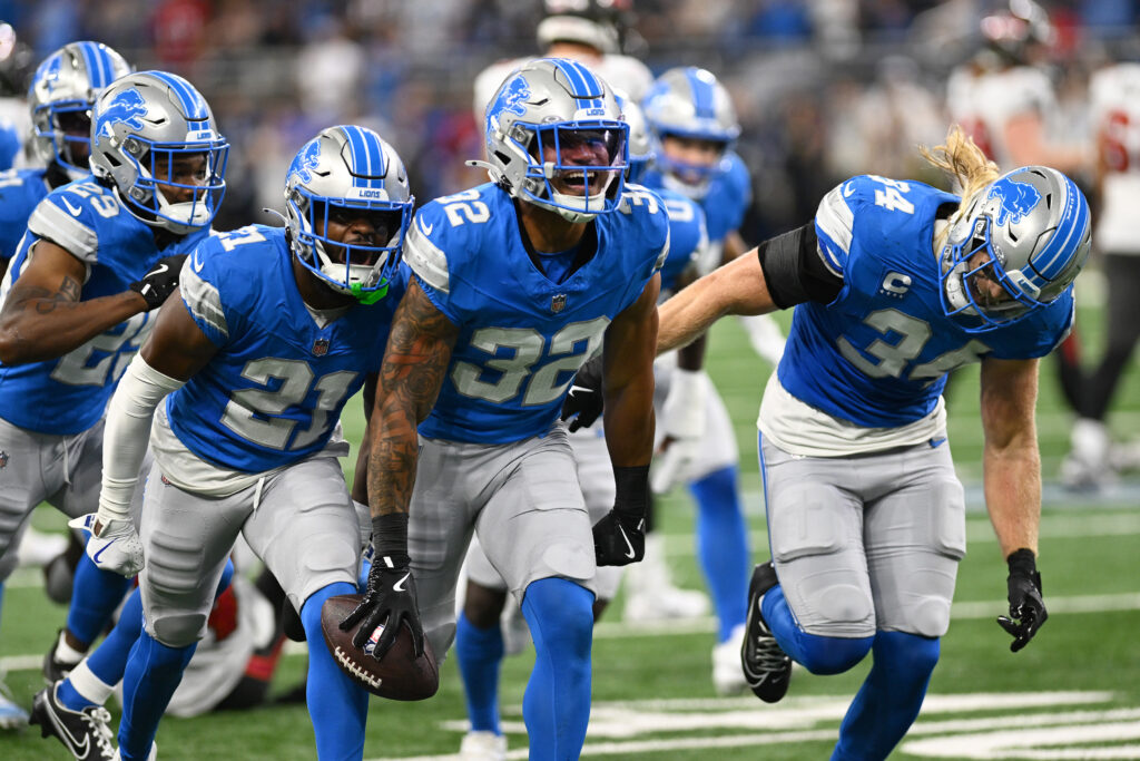 Detroit Lions safety Brian Branch (32) celebrates after intercepting a pass from Tampa Bay Buccaneers quarterback Baker Mayfield in the second quarter at Ford Field.