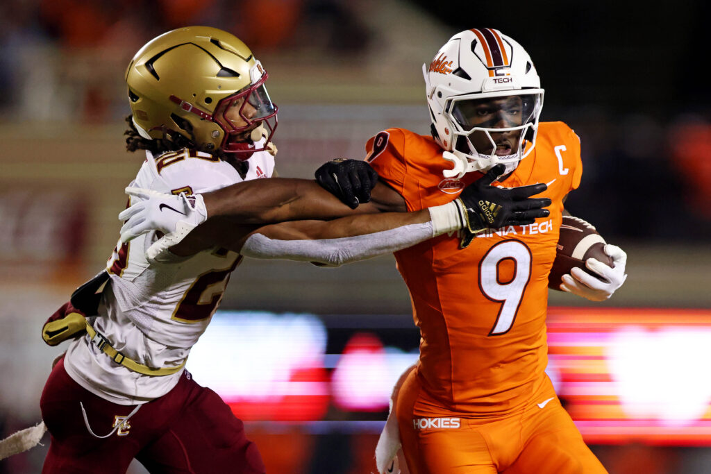 Virginia Tech Hokies wide receiver Da'Quan Felton (9) runs the ball against Boston College Eagles defensive back KP Price (20) during the first quarter at Lane Stadium. 