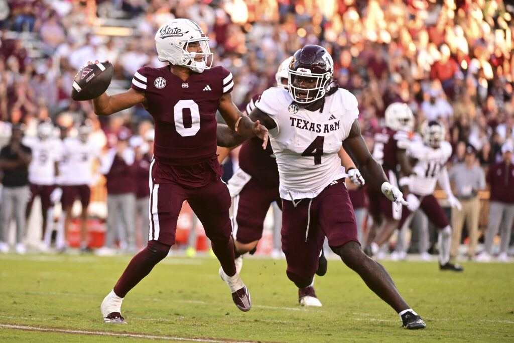 Mississippi State Bulldogs quarterback Michael Van Buren Jr. (0) drops back to pass against Texas A&M Aggies defensive lineman Shemar Stewart (4). 