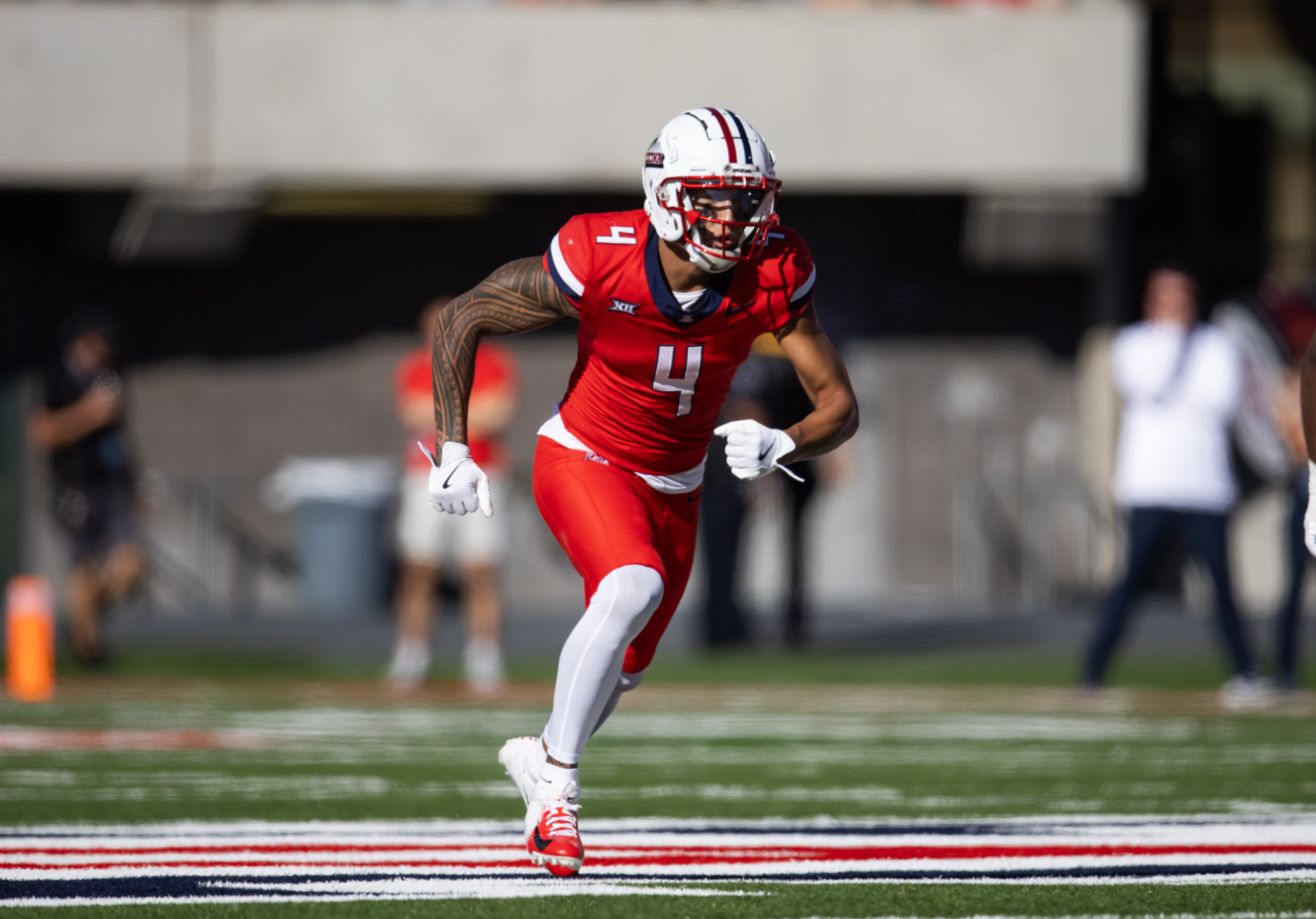 Arizona Wildcats wide receiver Tetairoa McMillan (4) against the Colorado Buffalos at Arizona Stadium.