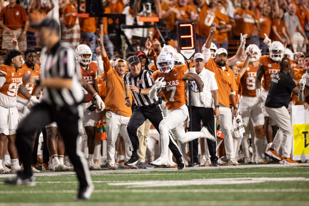 Texas Longhorns cornerback Jahdae Barron (7) intercepts a pass in the third quarter against the Georgia Bulldogs at Darrell K Royal-Texas Memorial Stadium.