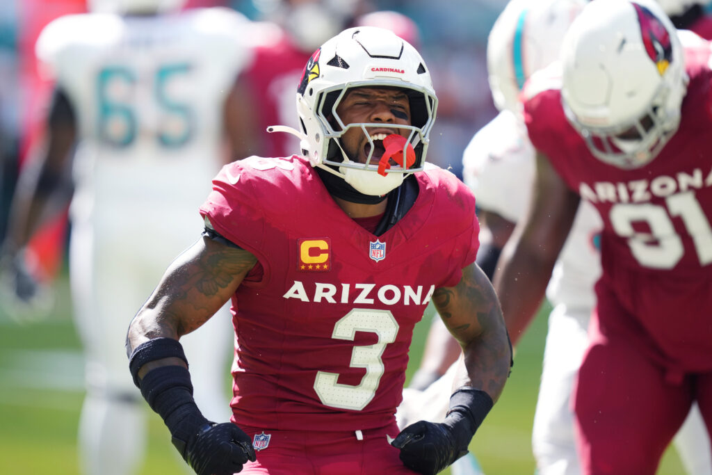 Arizona Cardinals safety Budda Baker (3) celebrates tackling Miami Dolphins wide receiver Jaylen Waddle (17) for a short gain in the thirdquarter at Hard Rock Stadium.