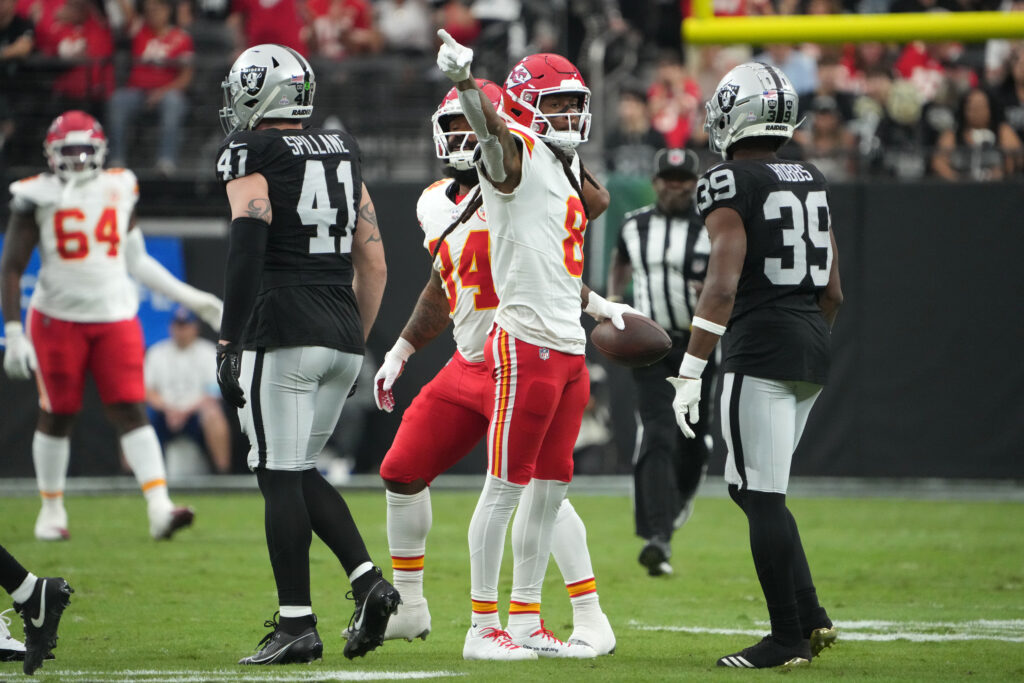 Kansas City Chiefs wide receiver DeAndre Hopkins gestures after a first down against the Las Vegas Raiders in the first half at Allegiant Stadium.