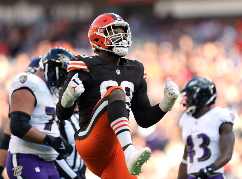 Cleveland Browns defensive end Za'Darius Smith celebrates after sacking Baltimore Ravens quarterback Lamar Jackson during the second half at Huntington Bank Field,