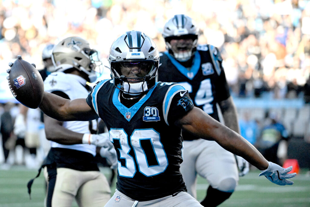 Carolina Panthers running back Chuba Hubbard celebrates after scoring the winning touchdown in the fourth quarter at Bank of America Stadium.