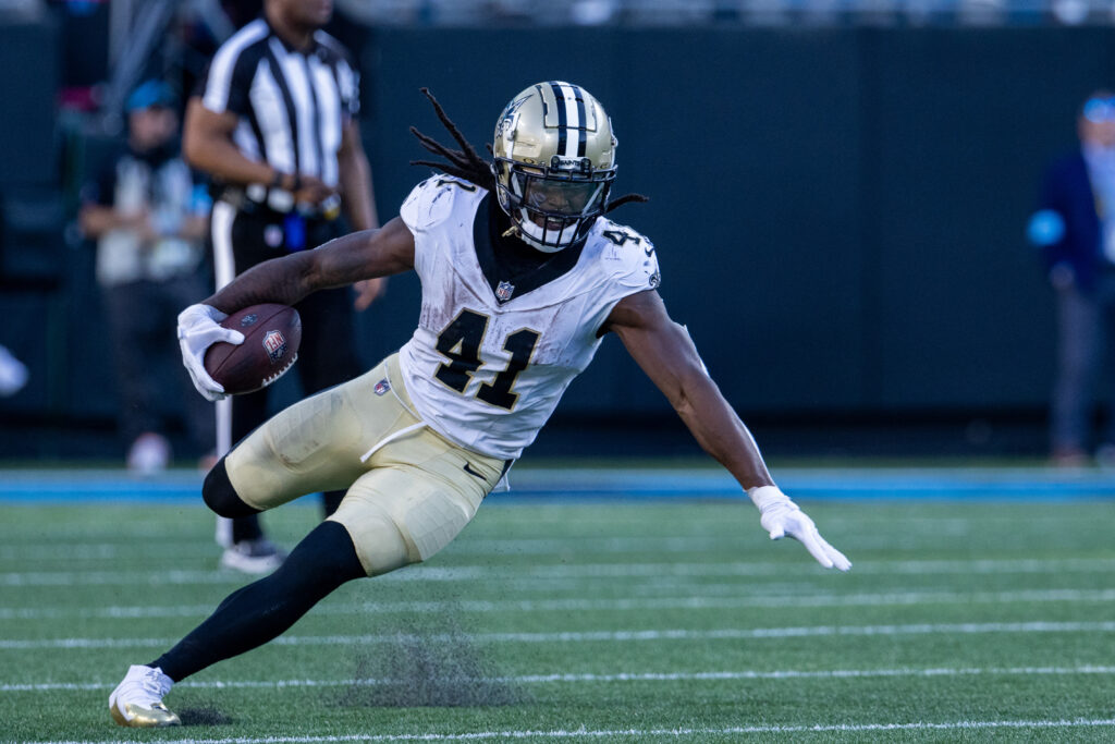 New Orleans Saints running back Alvin Kamara runs the ball against the Carolina Panthers during the fourth quarter at Bank of America Stadium.