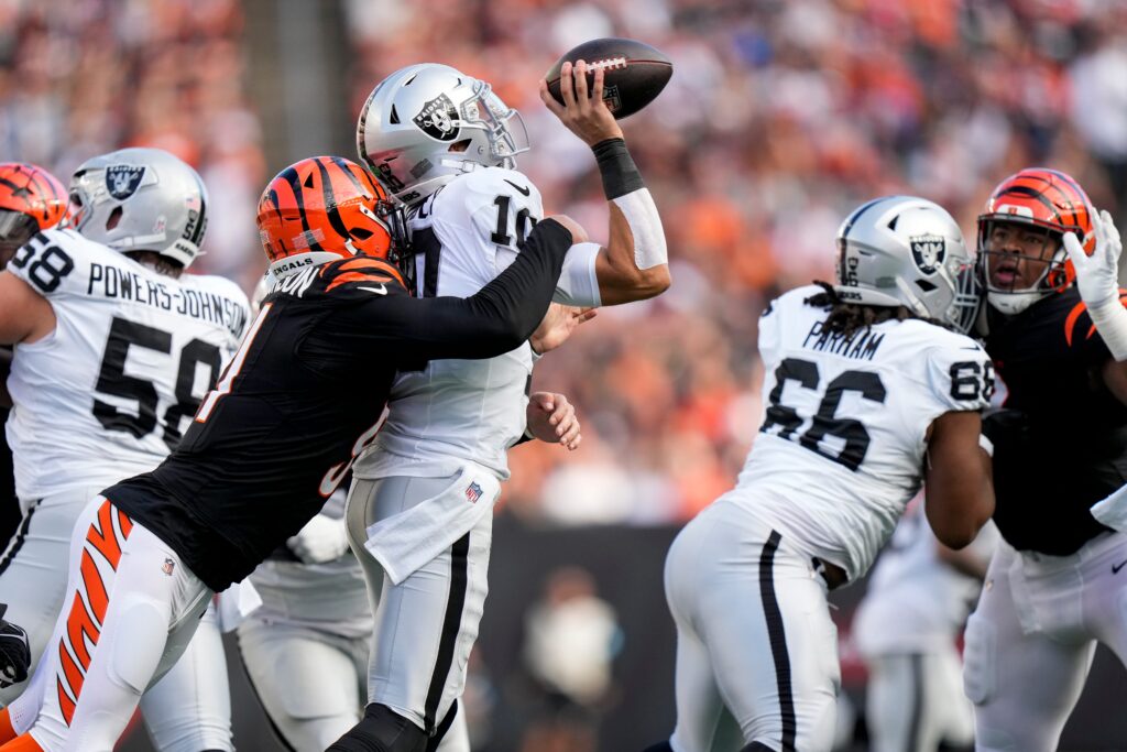 Cincinnati Bengals defensive end Trey Hendrickson sacks Las Vegas Raiders quarterback Desmond Ridder in the third quarter of the NFL Week 9.