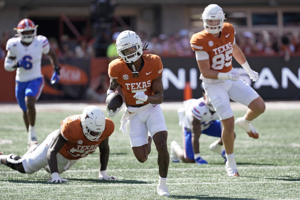 Texas Longhorns wide receiver Isaiah Bond runs for yardage after making a catch during the first half against the Florida Gators at Darrell K Royal-Texas Memorial Stadium.