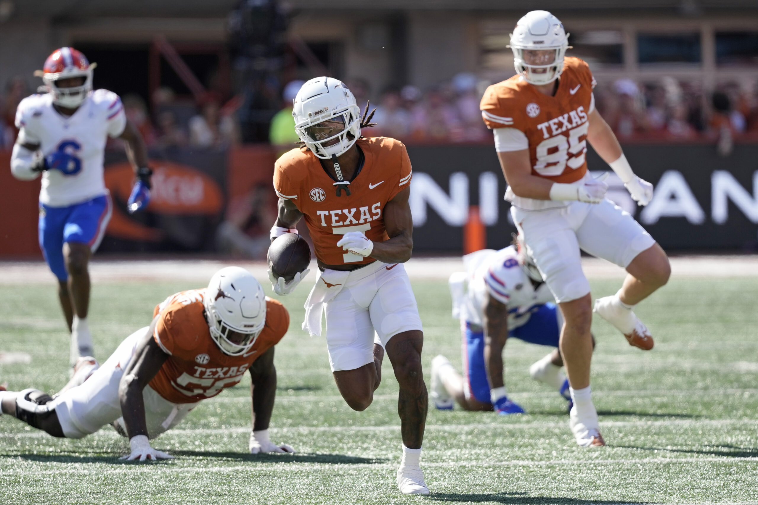 Texas Longhorns wide receiver Isaiah Bond runs for yardage after making a catch during the first half against the Florida Gators at Darrell K Royal-Texas Memorial Stadium.