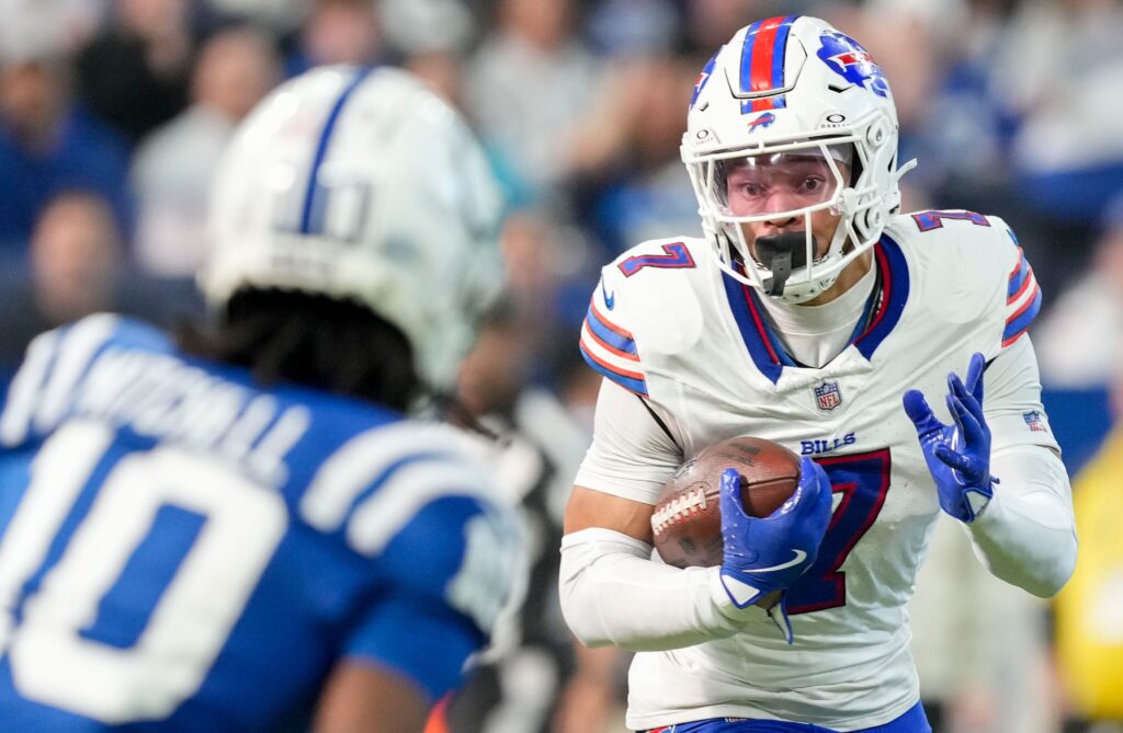 Buffalo Bills cornerback Taron Johnson rushes for a touchdown after intercepting the first pass of the game by Indianapolis Colts quarterback Joe Flacco during a game at Lucas Oil Stadium in Indianapolis.