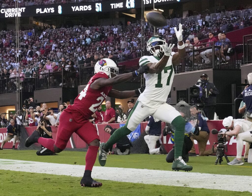 New York Jets wide receiver Davante Adams (17) cannot make a catch while defended by Arizona Cardinals cornerback Starling Thomas V (24) during the first quarter at State Farm Stadium 