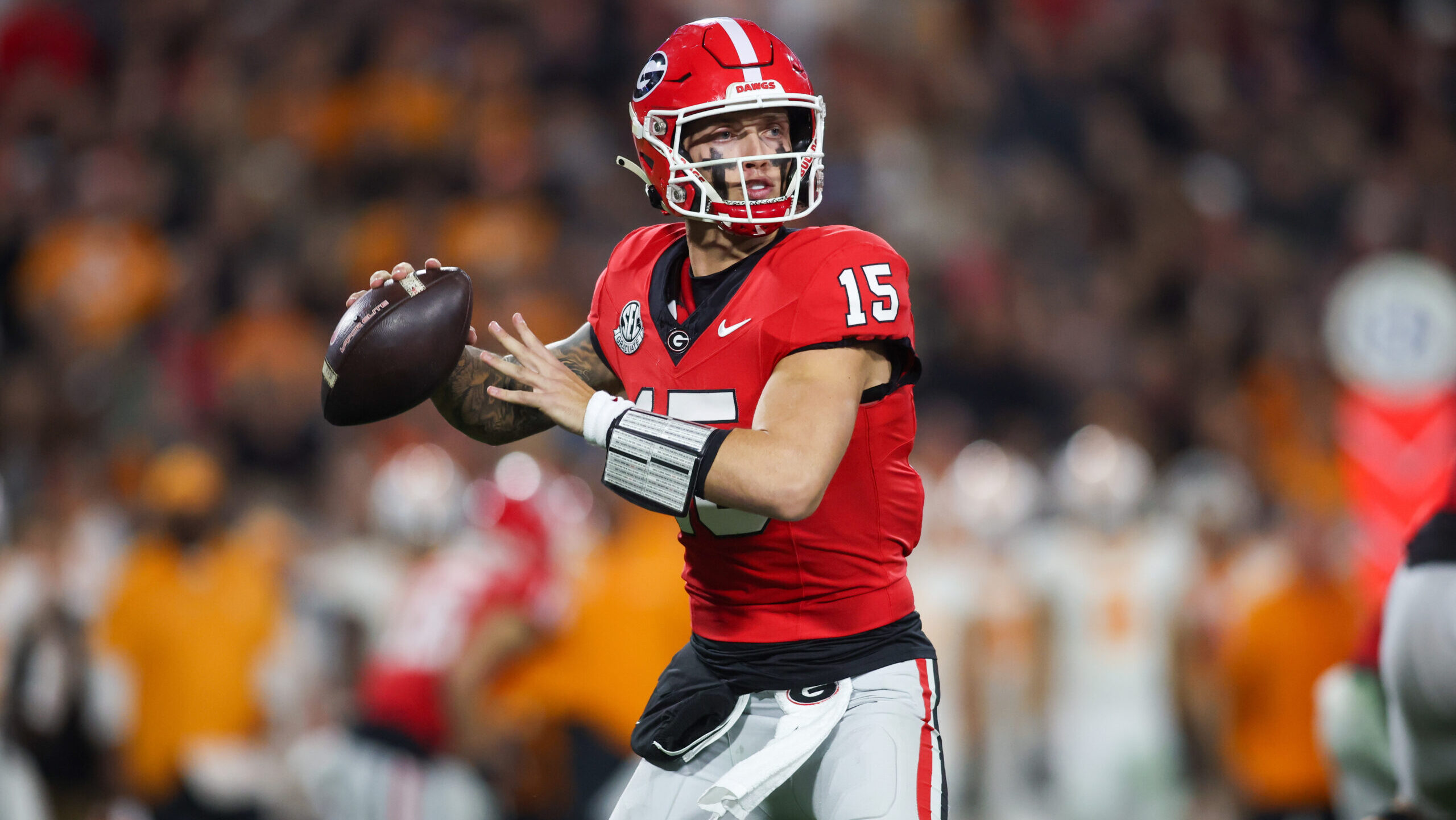 Georgia Bulldogs quarterback Carson Beck throws a pass against the Tennessee Volunteers in the first quarter at Sanford Stadium.