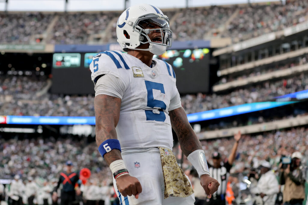 Indianapolis Colts quarterback Anthony Richardson (5) celebrates his touchdown against the New York Jets during the fourth quarter at MetLife Stadium.