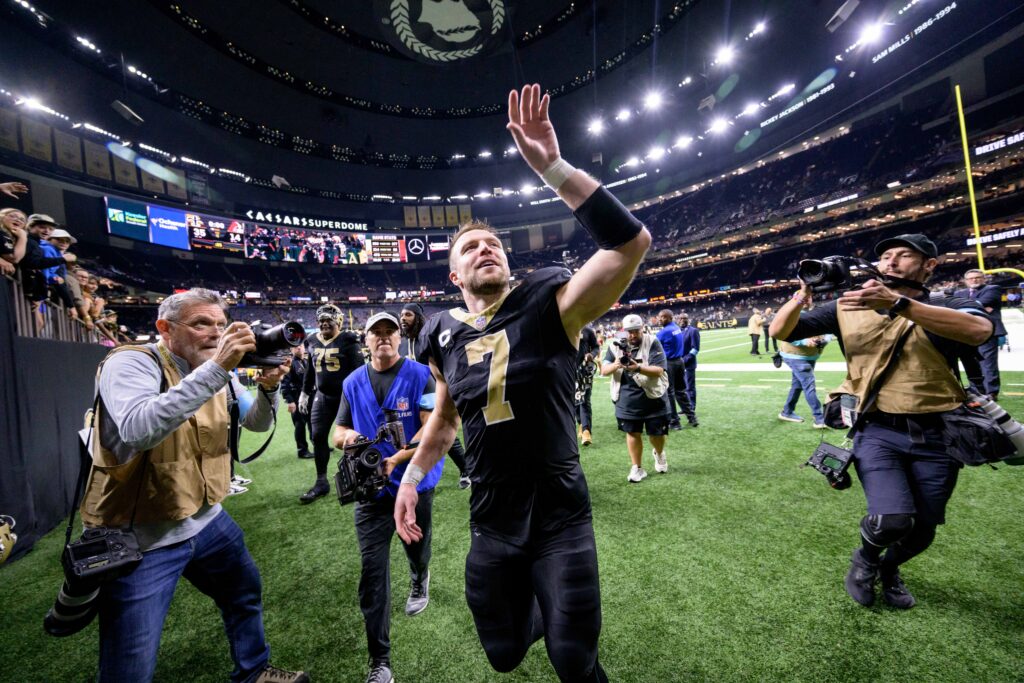 New Orleans Saints tight end Taysom Hill waves to fans at the end of the game against the Cleveland Browns at Caesars Superdome.