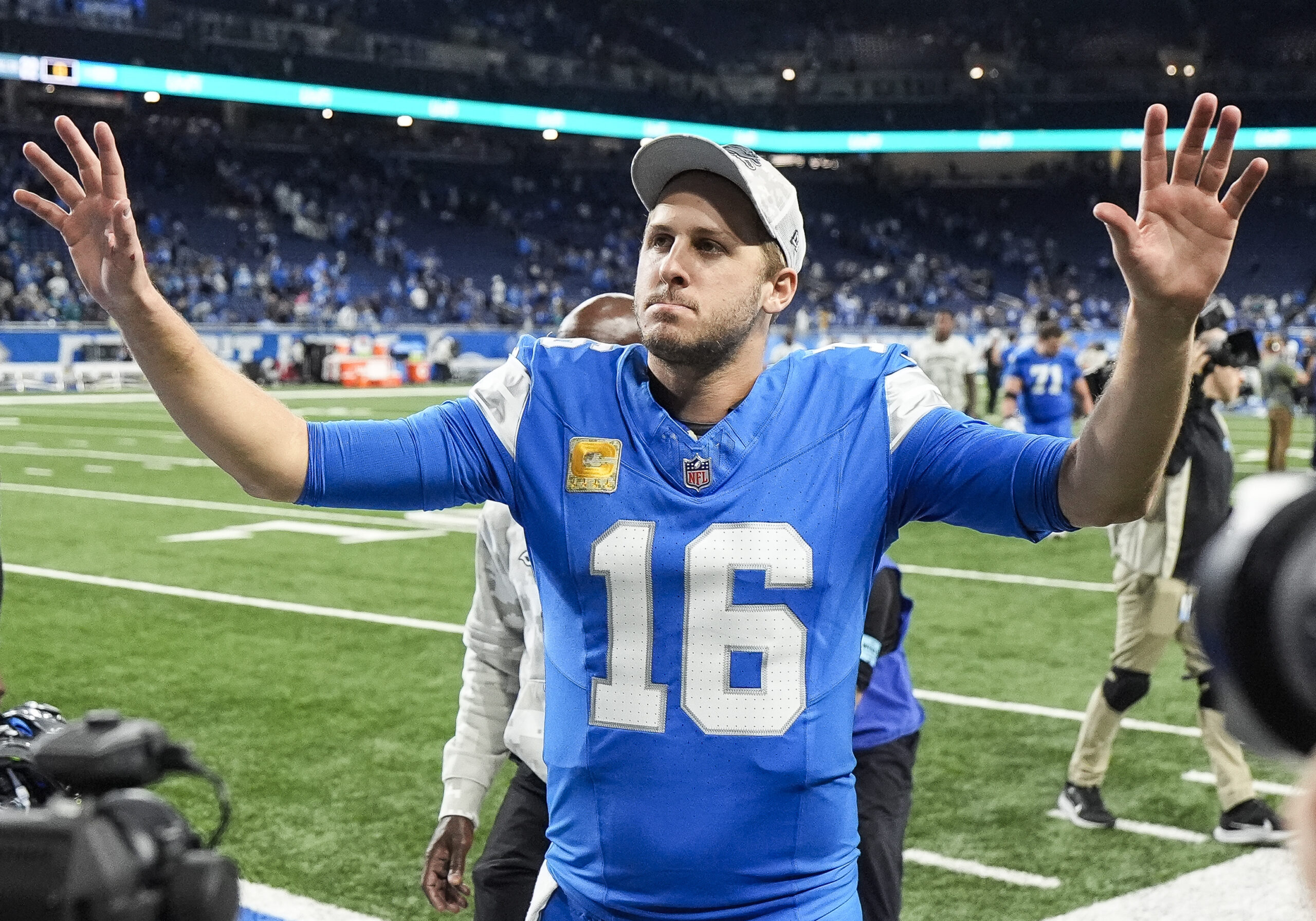 Detroit Lions quarterback Jared Goff (16) waves at fans as he exits the field after 52-6 win over Jacksonville Jaguars during the second half at Ford Field in Detroit on Sunday, Nov. 17, 2024.