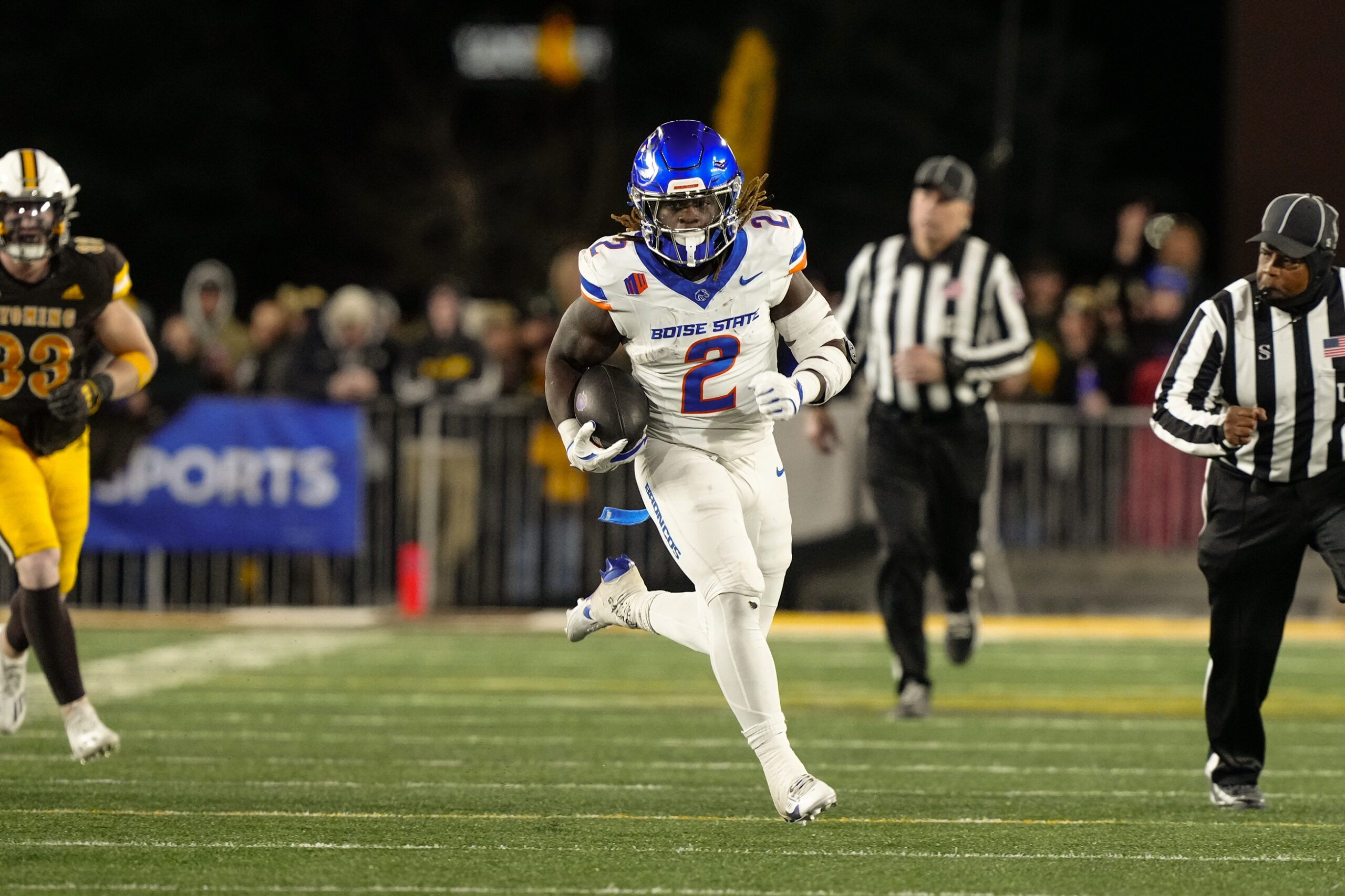 Boise State Broncos running back and Heisman Trophy candidate Ashton Jeanty (2) runs for a touchdown against the Wyoming Cowboys during the first quarter at Jonah Field at War Memorial Stadium.