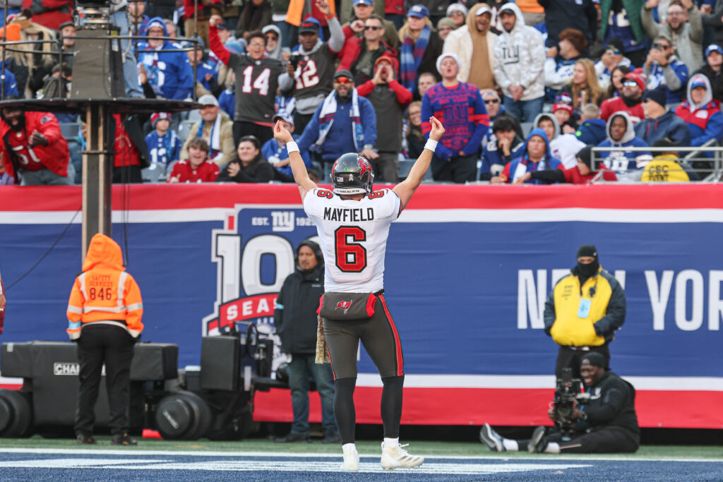 Tampa Bay Buccaneers quarterback Baker Mayfield (6) gestures after scoring a rushing touchdown during the first half against the New York Giants at MetLife Stadium.