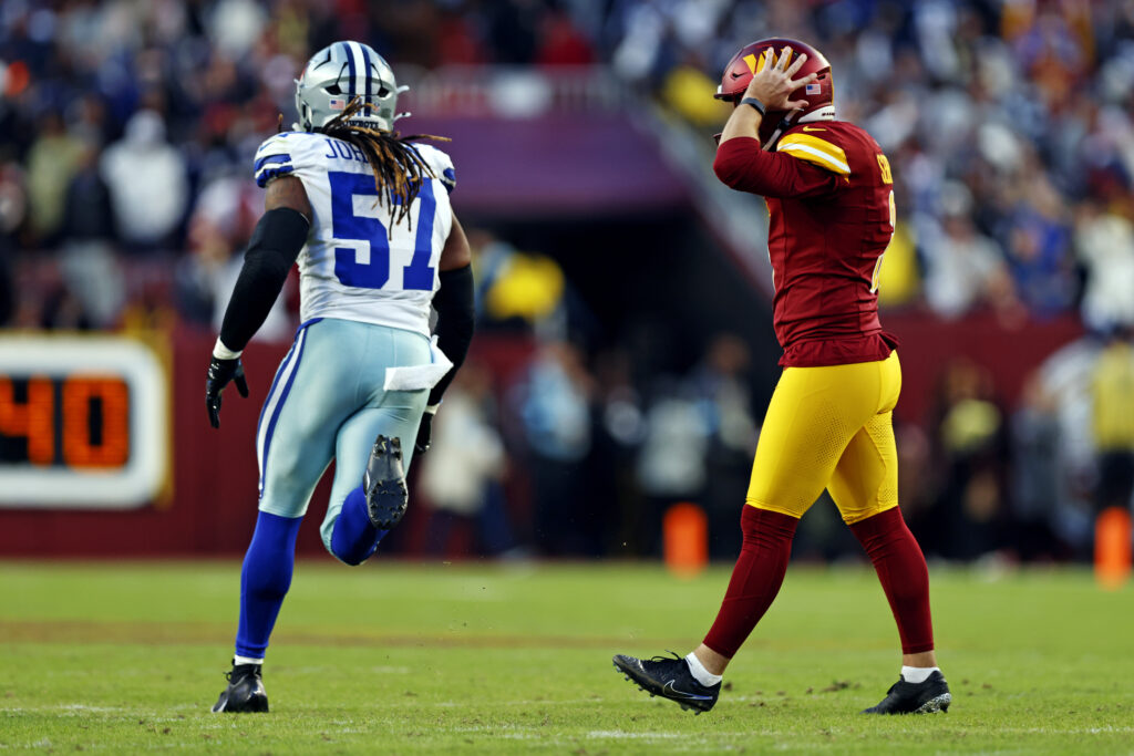 
Washington Commanders place kicker Austin Seibert (3) reacts after missing a point after try during the fourth quarter against the Dallas Cowboys.