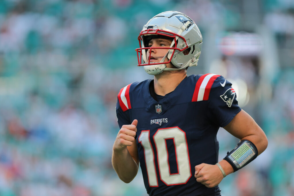 New England Patriots quarterback Drake Maye (10) looks on against the Miami Dolphins during the fourth quarter at Hard Rock Stadium. 