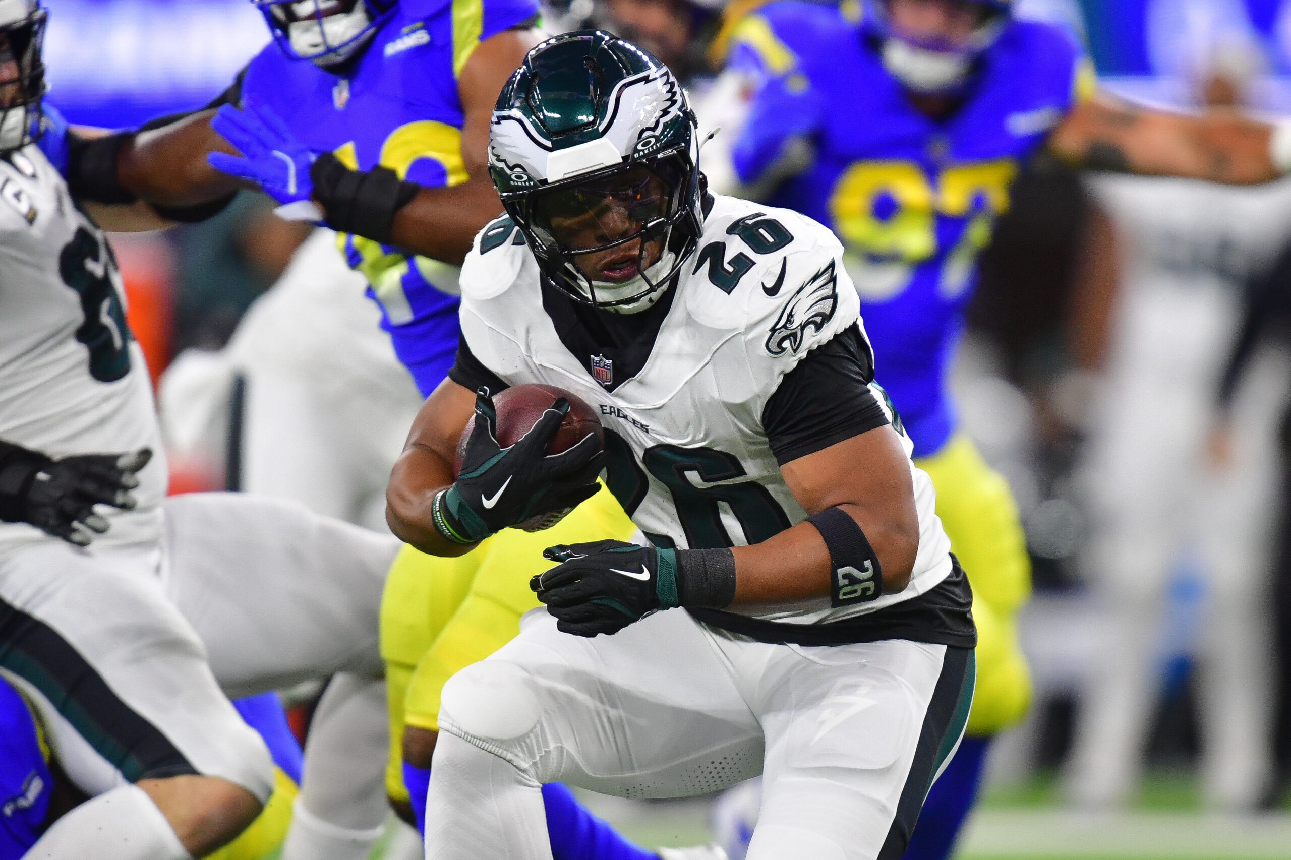 Philadelphia Eagles running back Saquon Barkley (26) runs the ball against the Los Angeles Rams during the first half at SoFi Stadium.