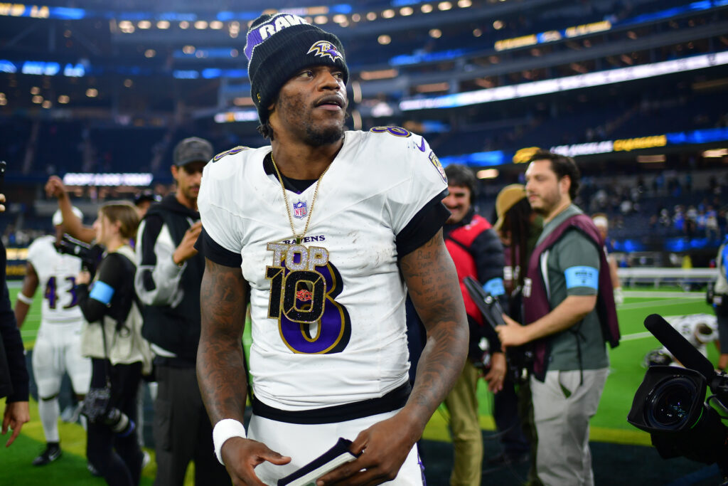 Baltimore Ravens quarterback Lamar Jackson (8) reacts following the victory against the Los Angeles Chargers at SoFi Stadium.