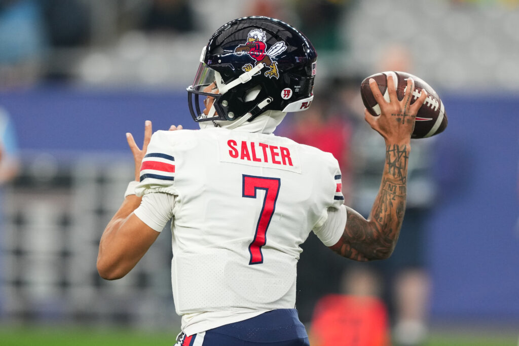 Liberty Flames quarterback Kaidon Salter (7) throws during warm ups before the 2024 Fiesta Bowl against the Oregon Ducks at State Farm Stadium. 