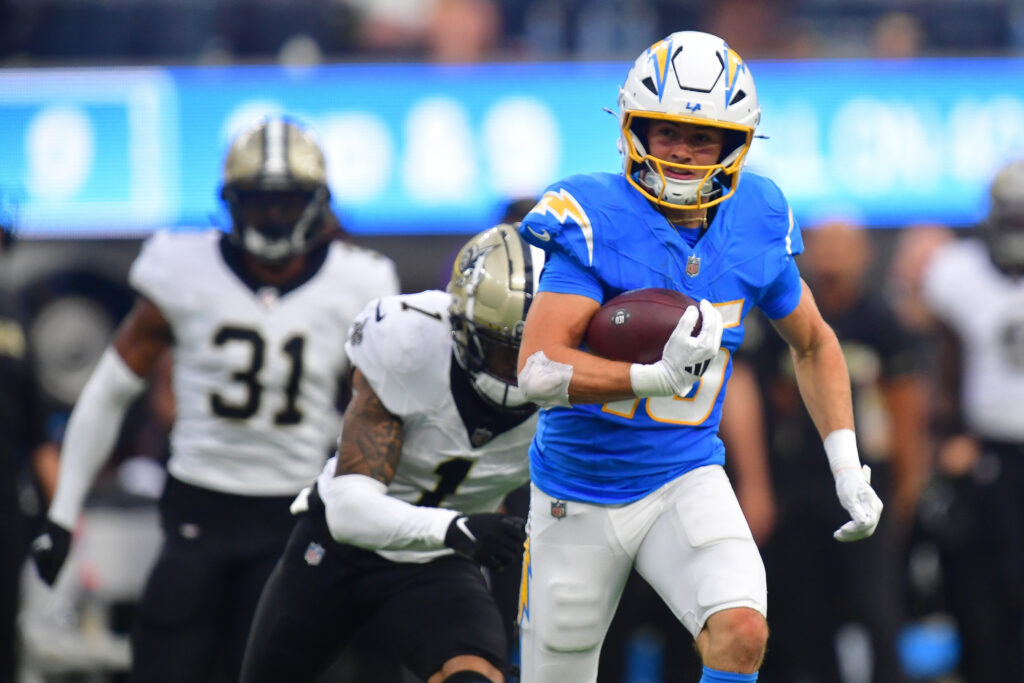 Los Angeles Chargers wide receiver Ladd McConkey (15) runs the ball for a touchdown against the New Orleans Saints during the second half at SoFi Stadium.