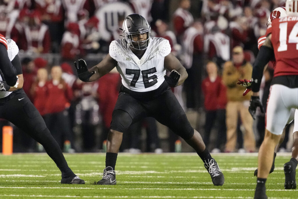 Oregon Ducks offensive linenam Josh Conerly Jr. (76) during the game against the Wisconsin Badgers at Camp Randall Stadium.