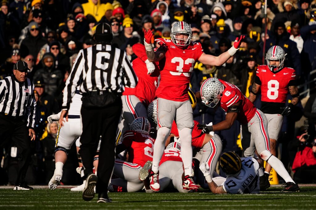 Ohio State Buckeyes defensive end Jack Sawyer (33) appeals for a flag from the official during the second half of the NCAA football game against the Michigan Wolverines at Ohio Stadium in Columbus 