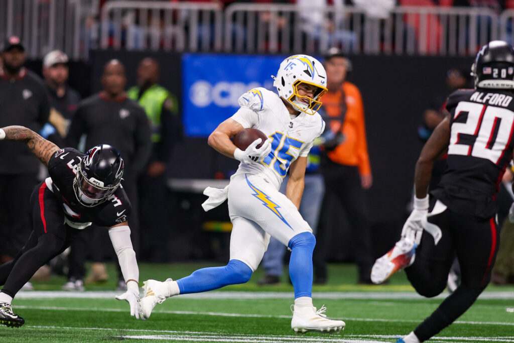 Los Angeles Chargers wide receiver Ladd McConkey (15) runs after a catch against the Atlanta Falcons in the first quarter at Mercedes-Benz Stadium.