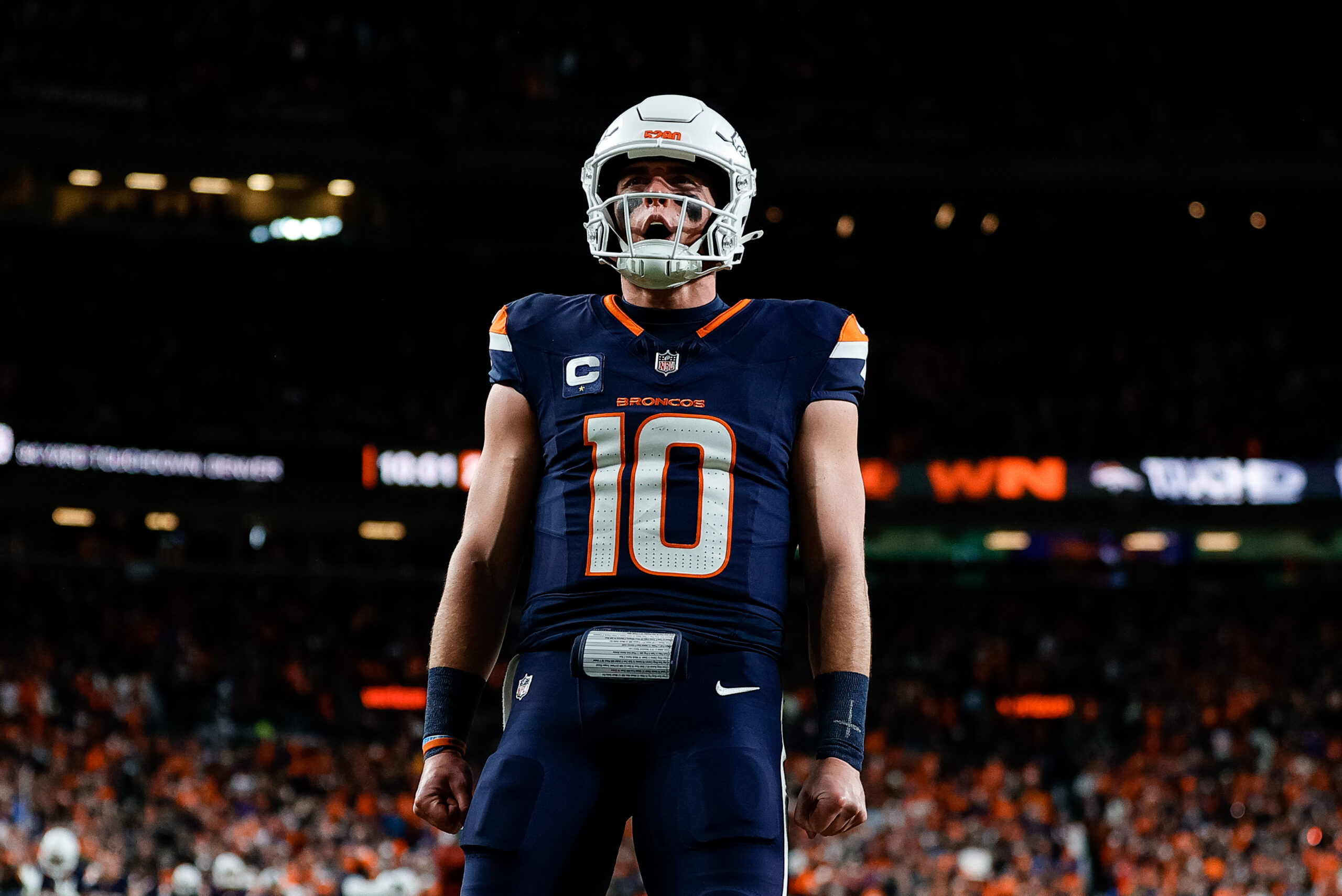 Denver Broncos quarterback Bo Nix (10) reacts after a play in the third quarter against the Cleveland Browns at Empower Field at Mile High.